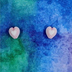 Small heart shaped stud earrings.